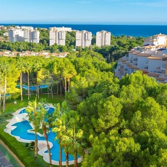 Apartment In Campoamor Overlooking The Swimming Pool Dış mekan fotoğraf