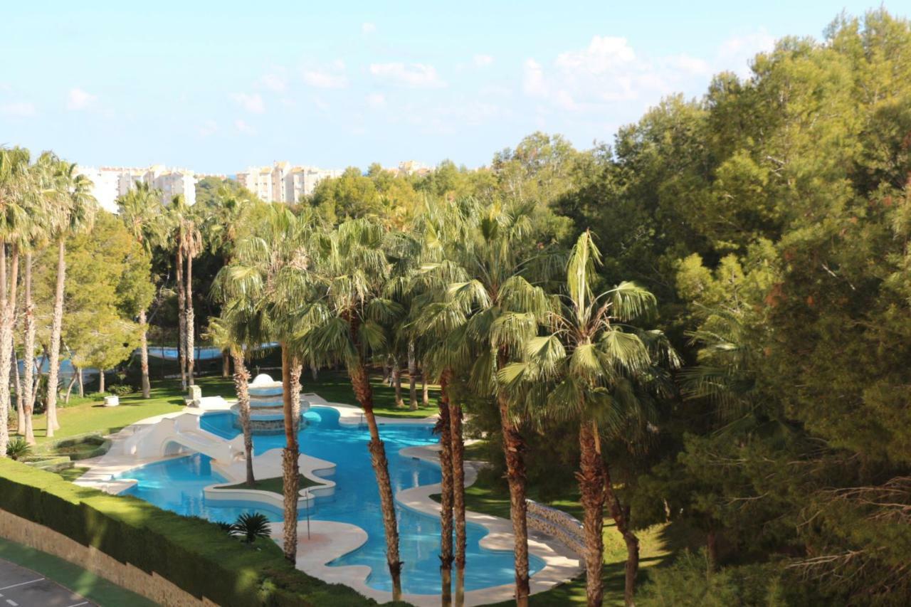 Apartment In Campoamor Overlooking The Swimming Pool Dış mekan fotoğraf